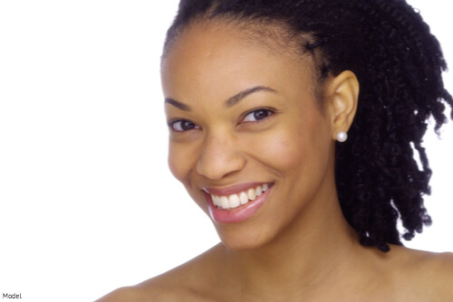 Woman with clear skin smiling