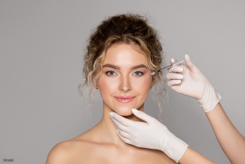 Woman receiving an injectable treatment