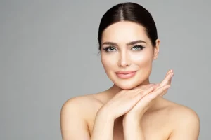 a portrait of a woman with smooth skin after skin rejuvenation treatments