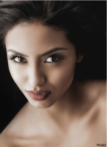 Woman puckering up her lips