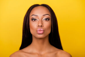 A woman pursing her lips after JUVÉDERM fillers in Mill Valley, CA